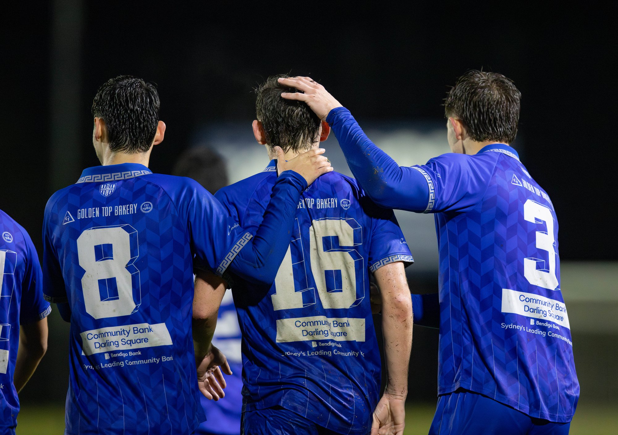 Sydney Olympic FC celebrating a cup win